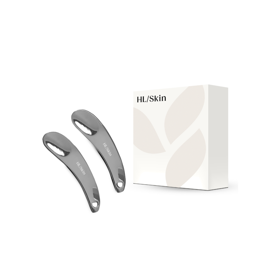 HL/Skin Skincare Spatula Set of two silver zinc alloy spatulas displayed with HL/Skin packaging